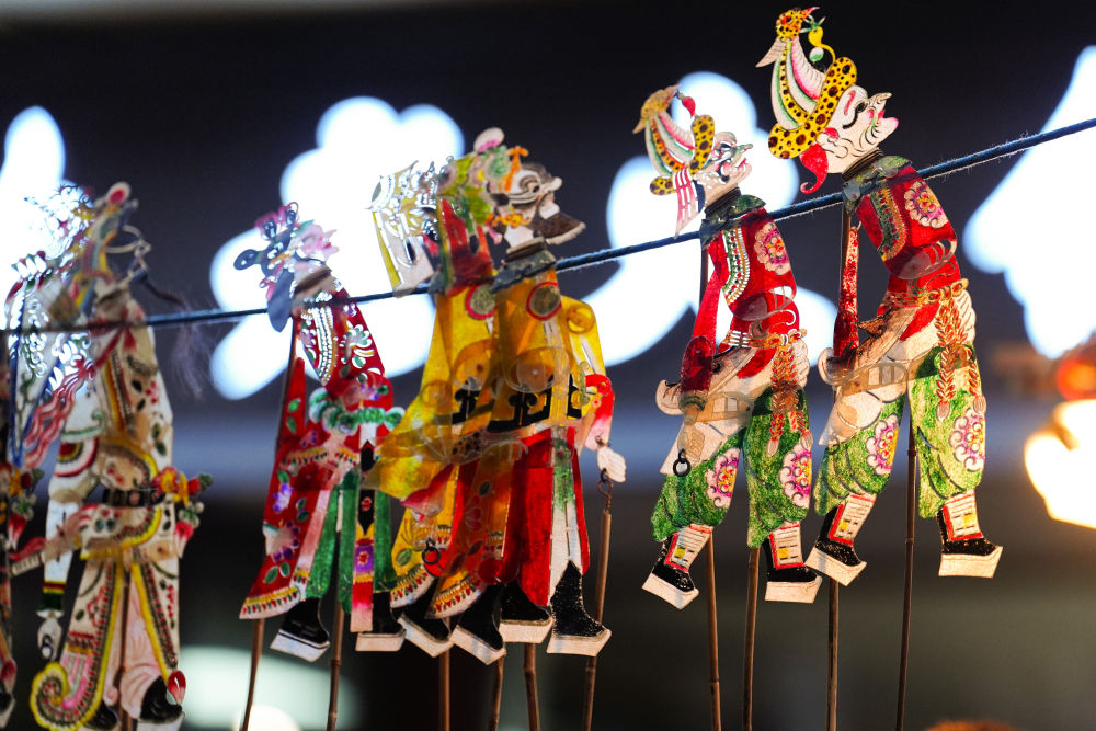 圖片故事丨老周的皮影進(jìn)城記